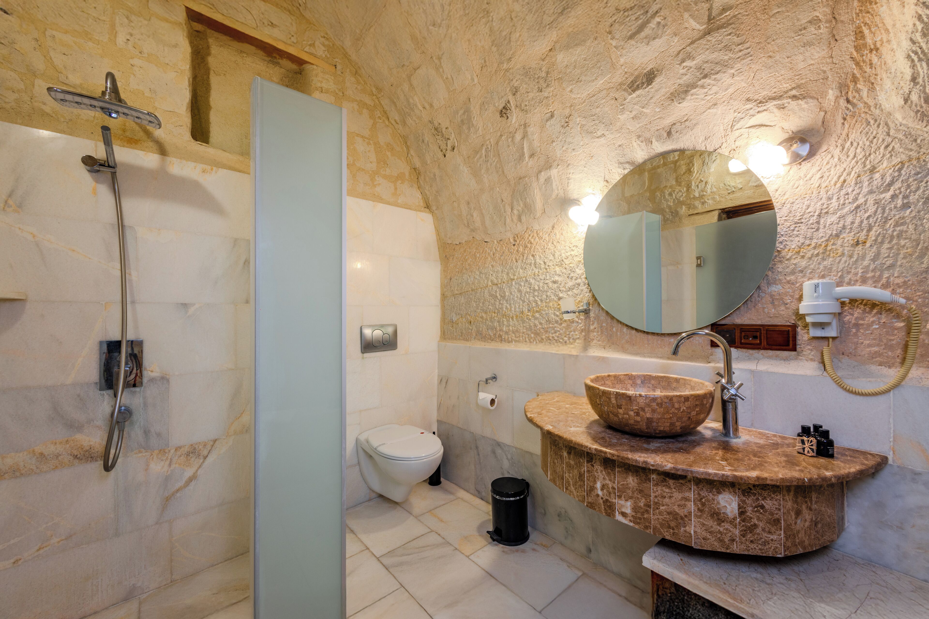 luxury cave suite | bathroom | separate bathtub and shower, jetted bath, rainfall showerhead