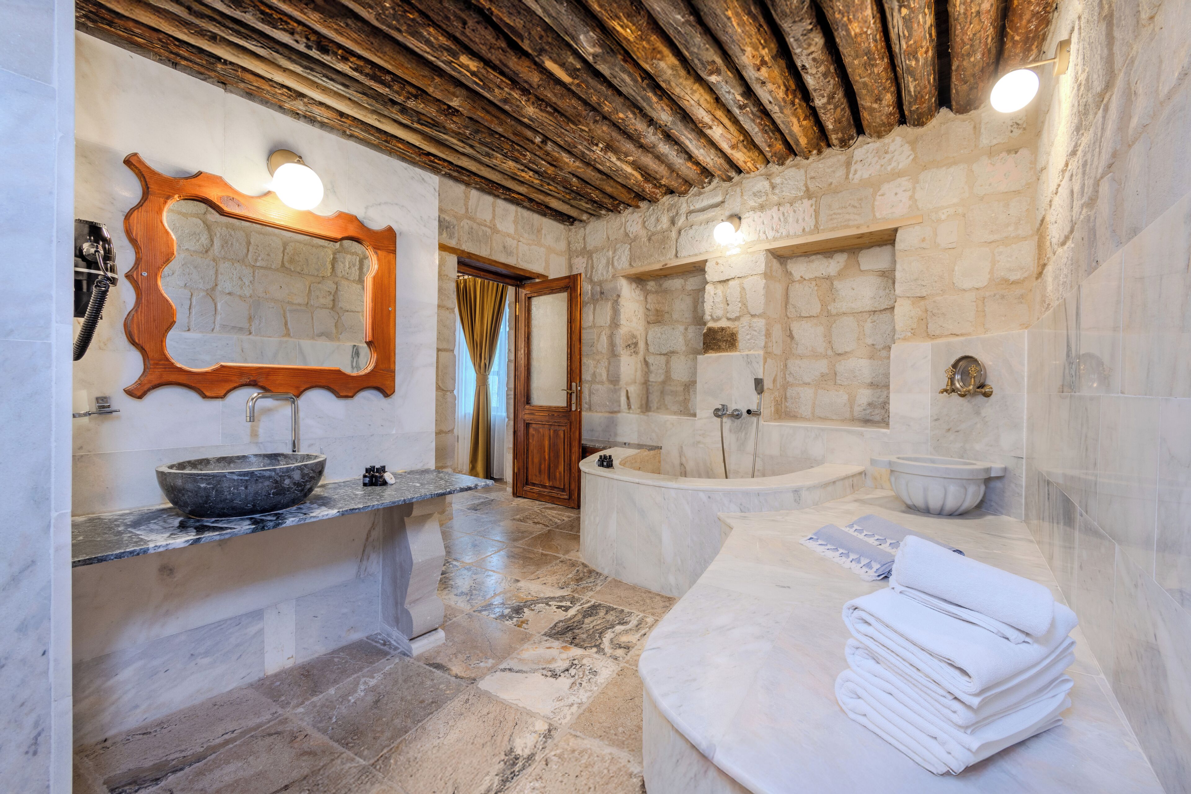deluxe triple cave suite | bathroom | separate bathtub and shower, jetted bath, rainfall showerhead