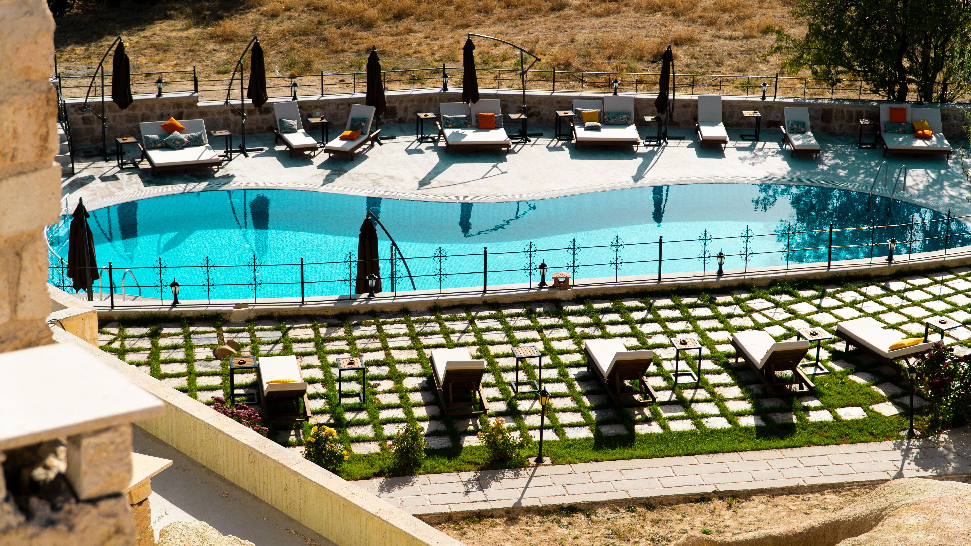 outdoor pool, open 6:00 am to 8:30 pm, pool loungers