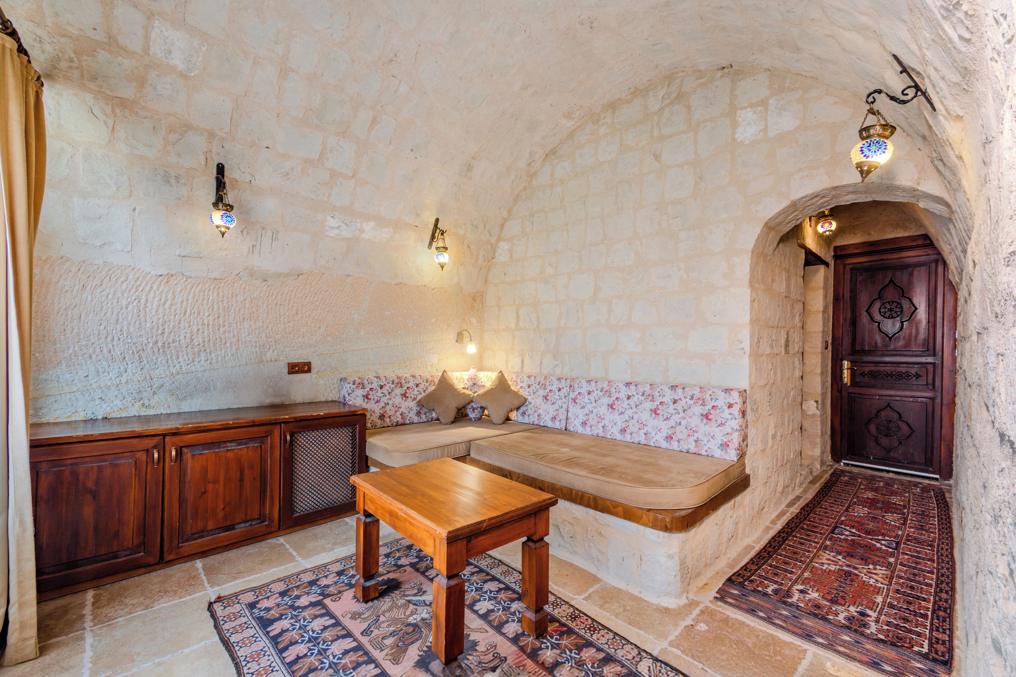 luxury cave suite | living area | 60-cm plasma tv with satellite channels, tv