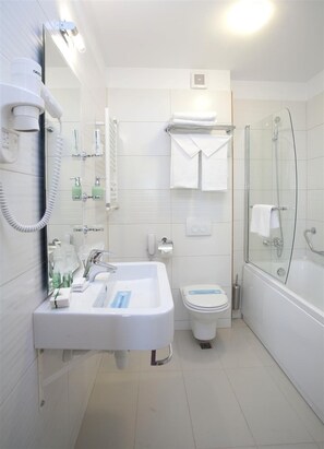 Hair dryer, dressing gowns, slippers, towels