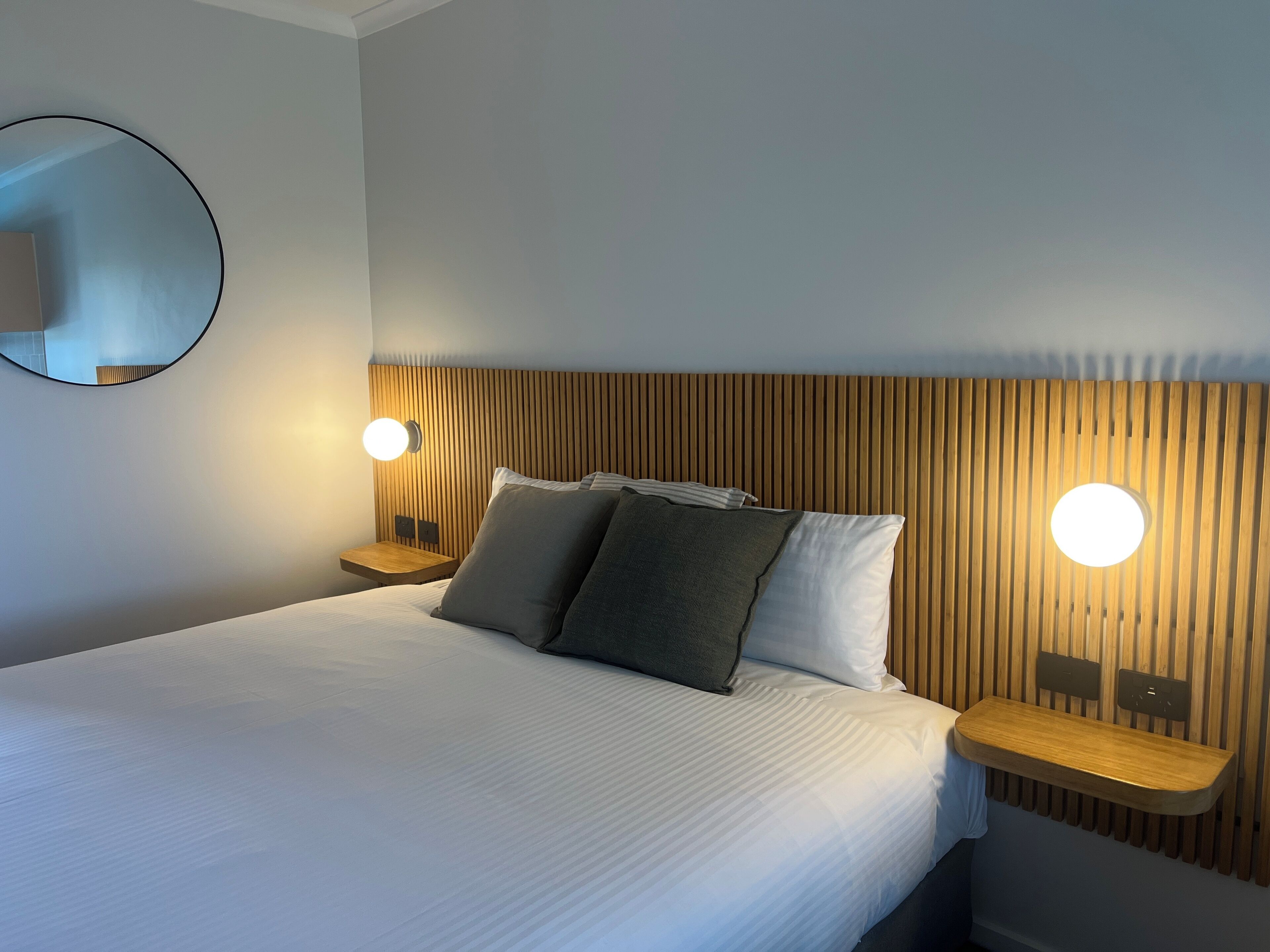 deluxe room, 1 king bed | bathroom | shower, hair dryer, towels