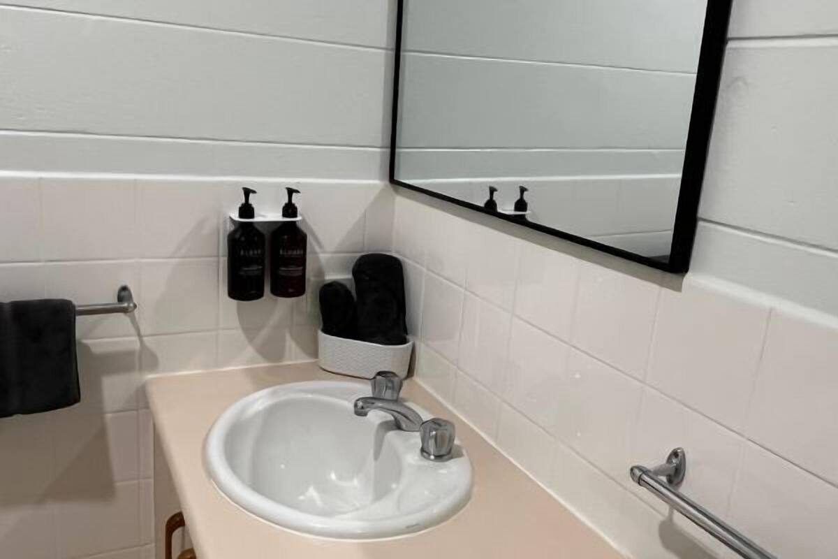 2 bedrooms, premium bedding, laptop workspace, blackout curtains