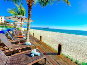 On the beach, beach towels