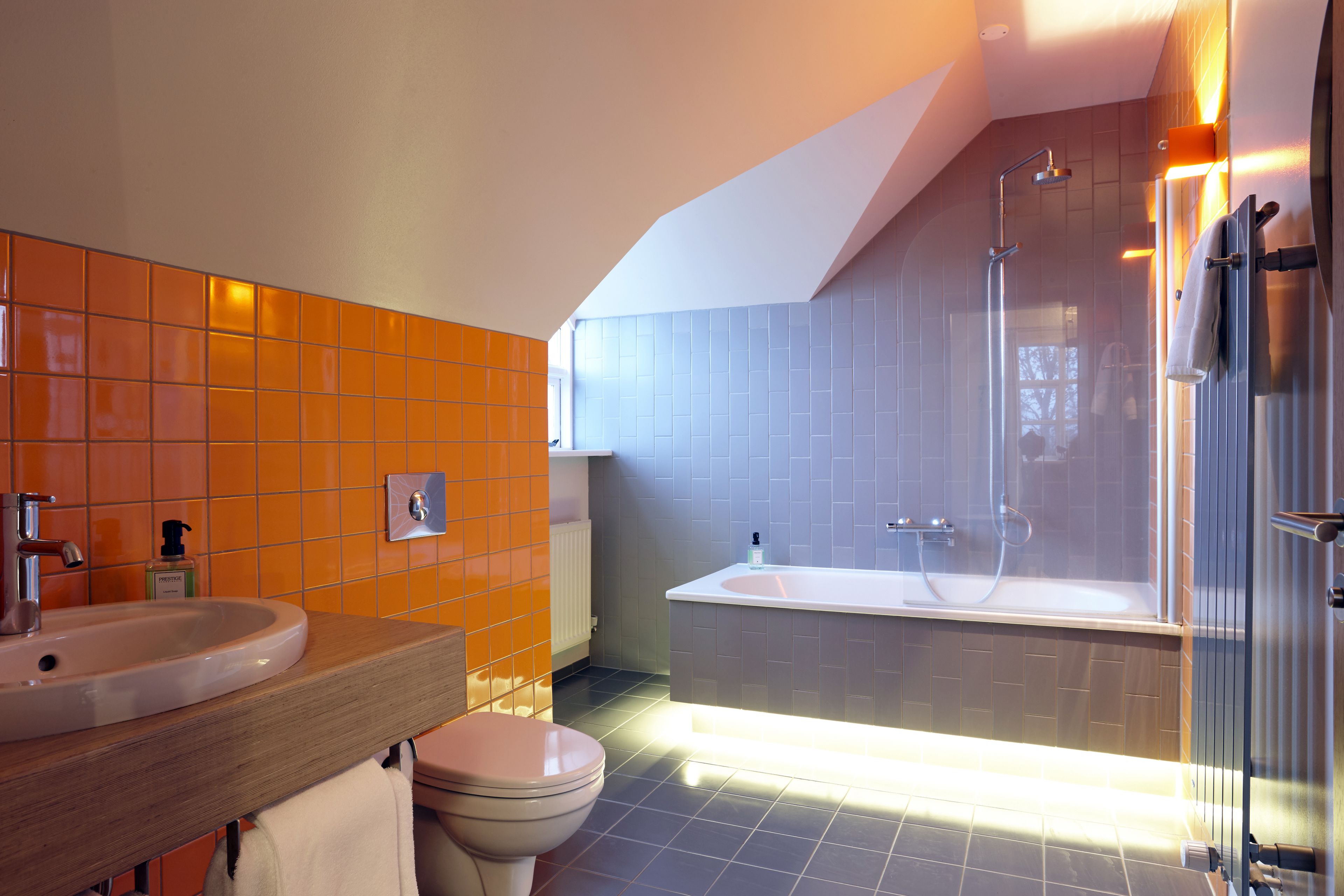 suite | bathroom | shower, designer toiletries, hair dryer, towels