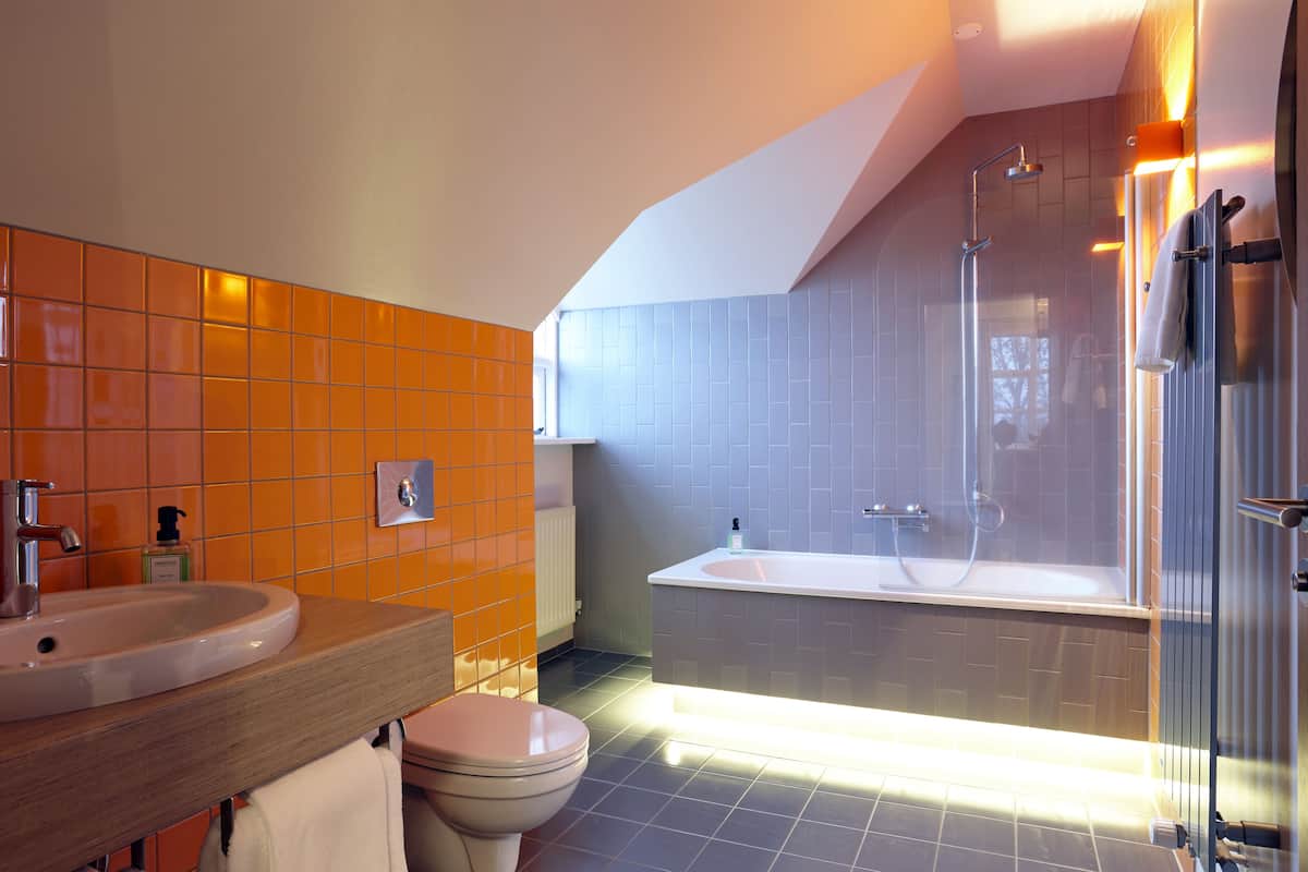 suite | bathroom | shower, designer toiletries, hair dryer, towels