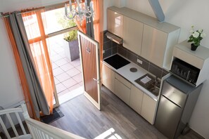 Lejlighed - 1 soveværelse - terrasse | Privat køkken | Køleskab/fryser i fuld størrelse, mikrobølgeovn, kogeplade, elkedel