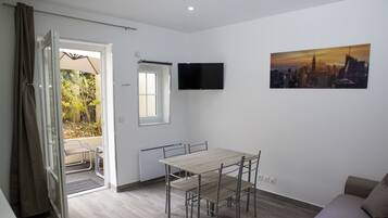 1 Bedroom Standing Apartment with Terrace (4 persons) | Living area | Flat-screen TV