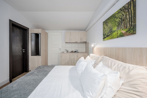 Superior Room with Kitchenette | Desk, laptop workspace, soundproofing, iron/ironing board