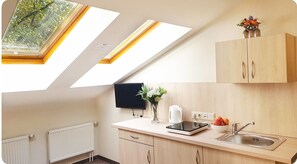 Fridge, microwave, electric kettle, high chair