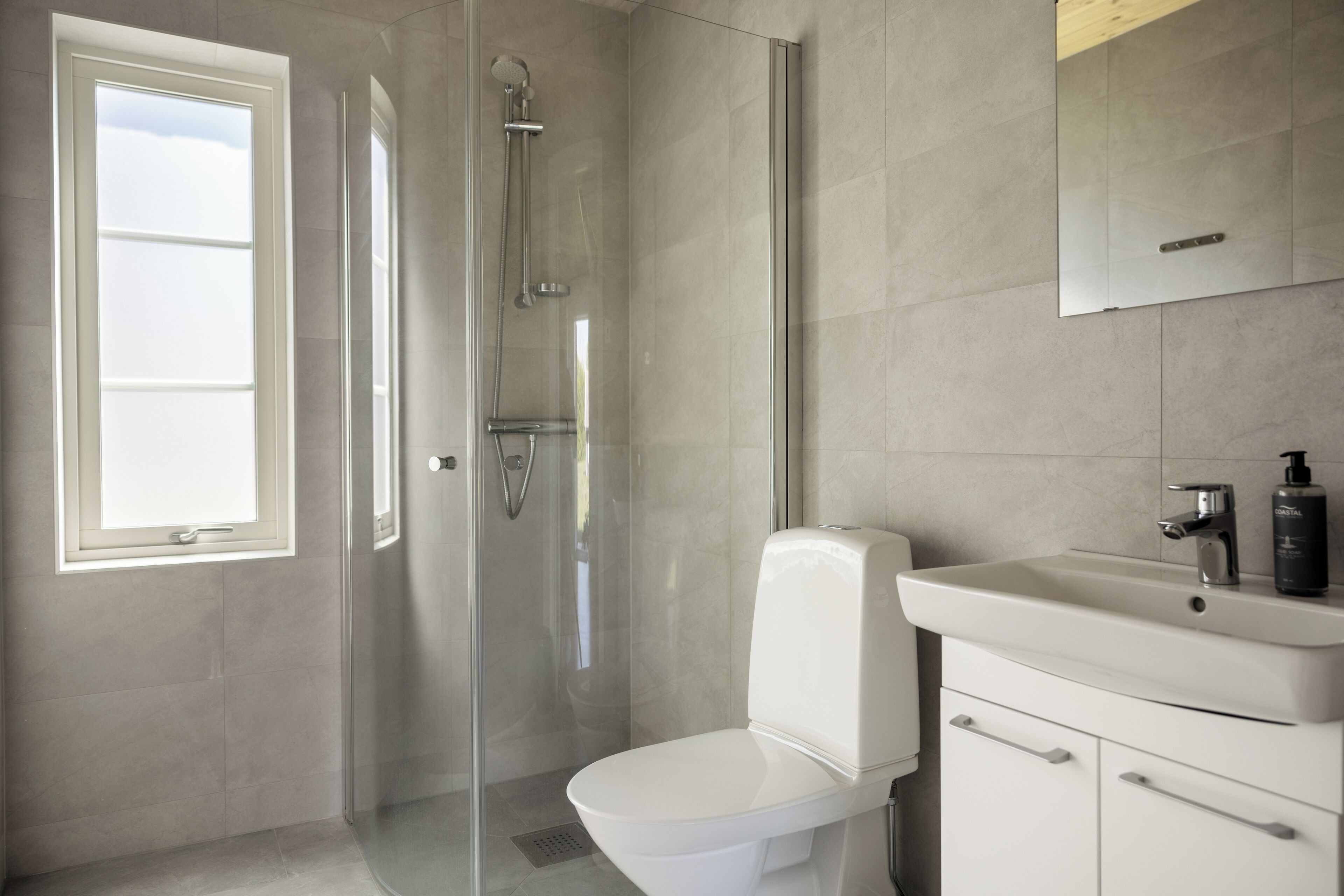 premium cabin | bathroom | hair dryer, towels