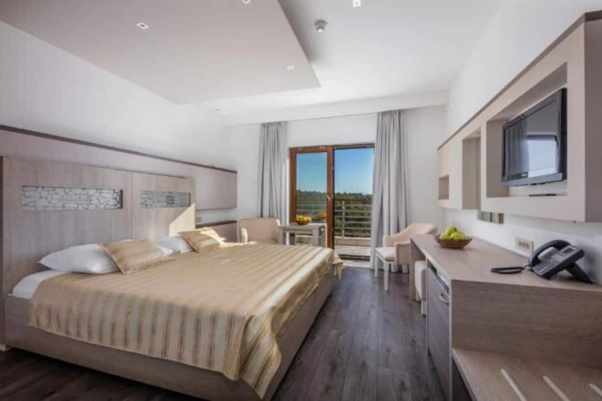 Memory-foam beds, minibar, in-room safe, desk