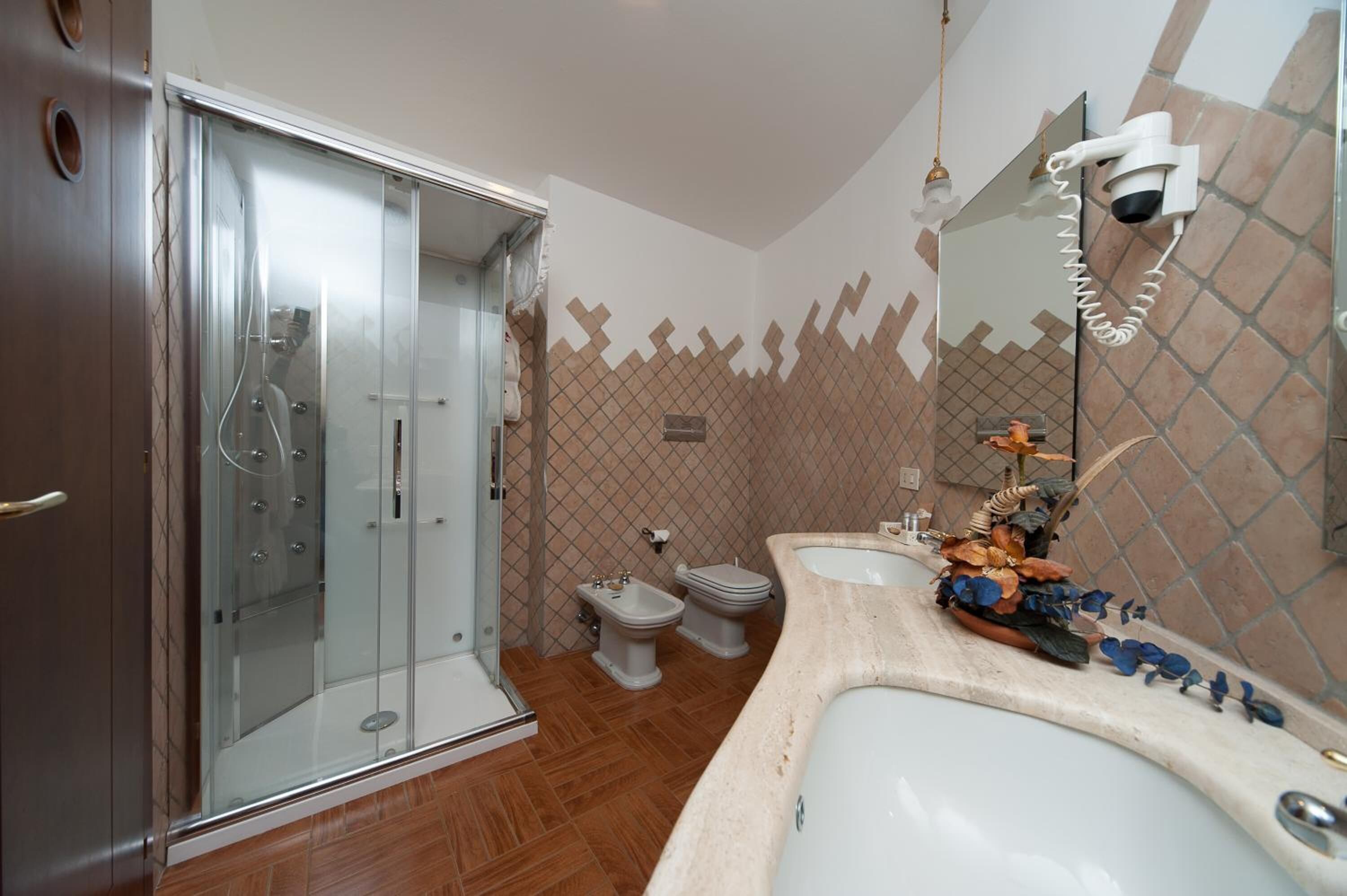 shower, free toiletries, hair dryer, slippers