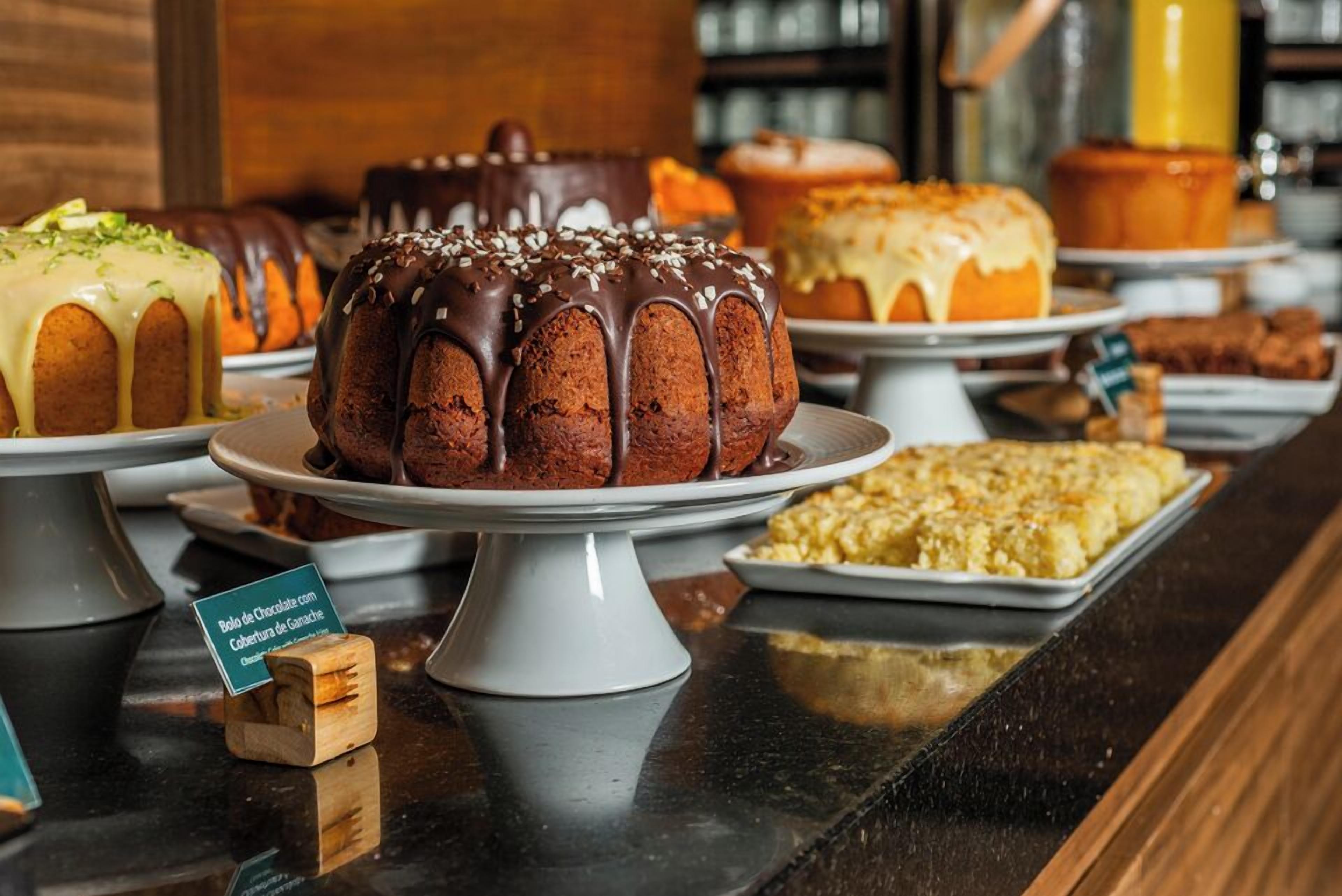 A variety of cakes and pastries on display.