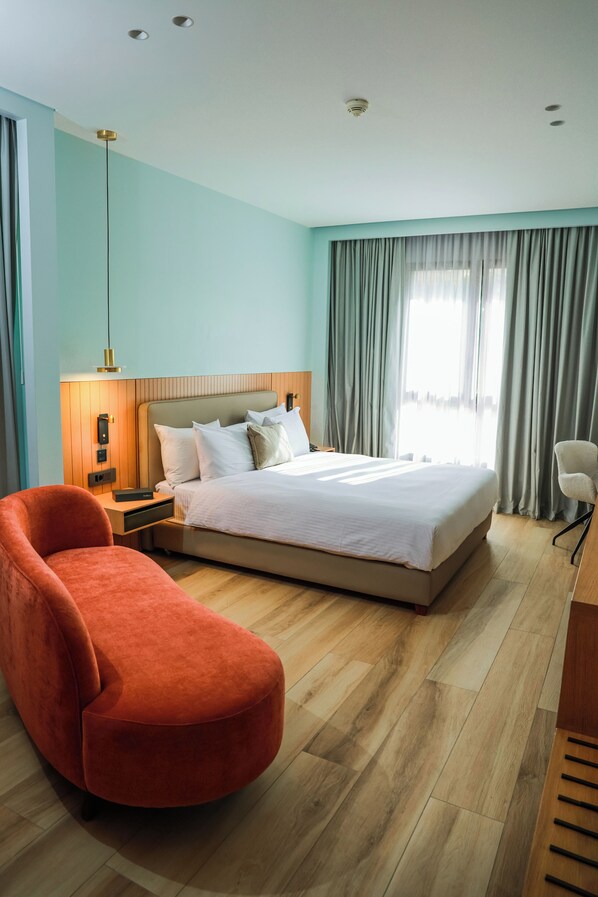 Renovated Room | Premium bedding, down comforters, in-room safe, desk
