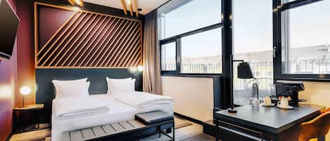 Premium bedding, pillowtop beds, desk, blackout drapes