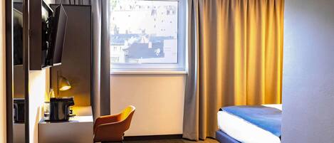 Premium bedding, pillowtop beds, desk, blackout drapes