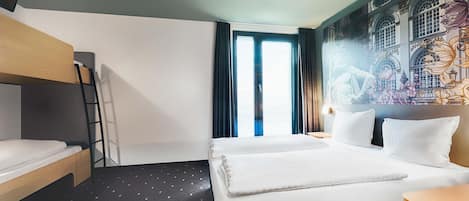 Premium bedding, pillowtop beds, desk, blackout drapes