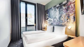 Premium bedding, pillowtop beds, desk, blackout drapes