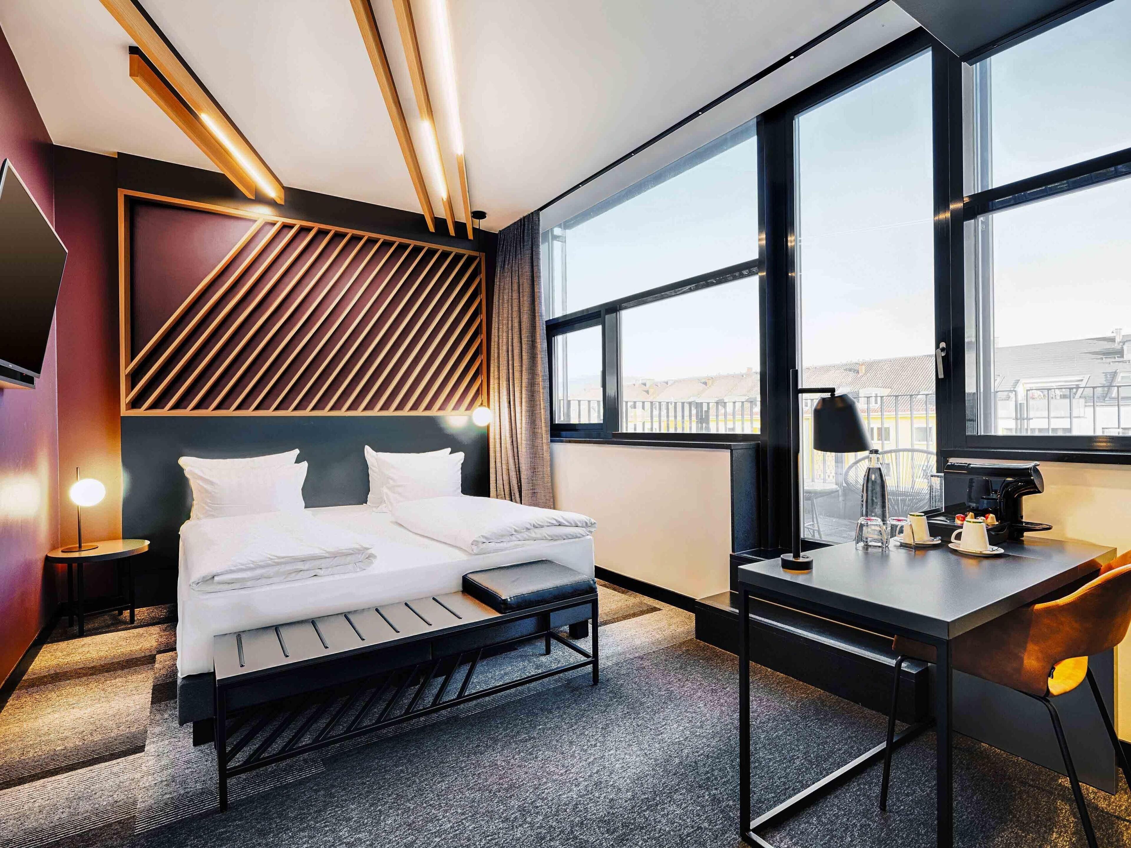 Premium bedding, pillow-top beds, desk, blackout curtains