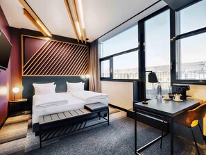 Premium bedding, pillowtop beds, desk, blackout drapes