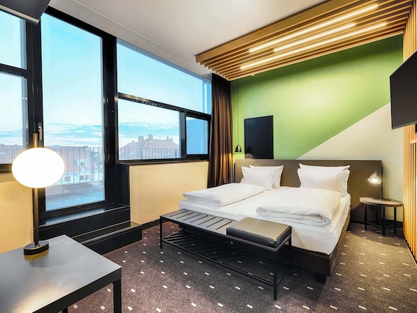 Premium bedding, pillow-top beds, desk, blackout curtains