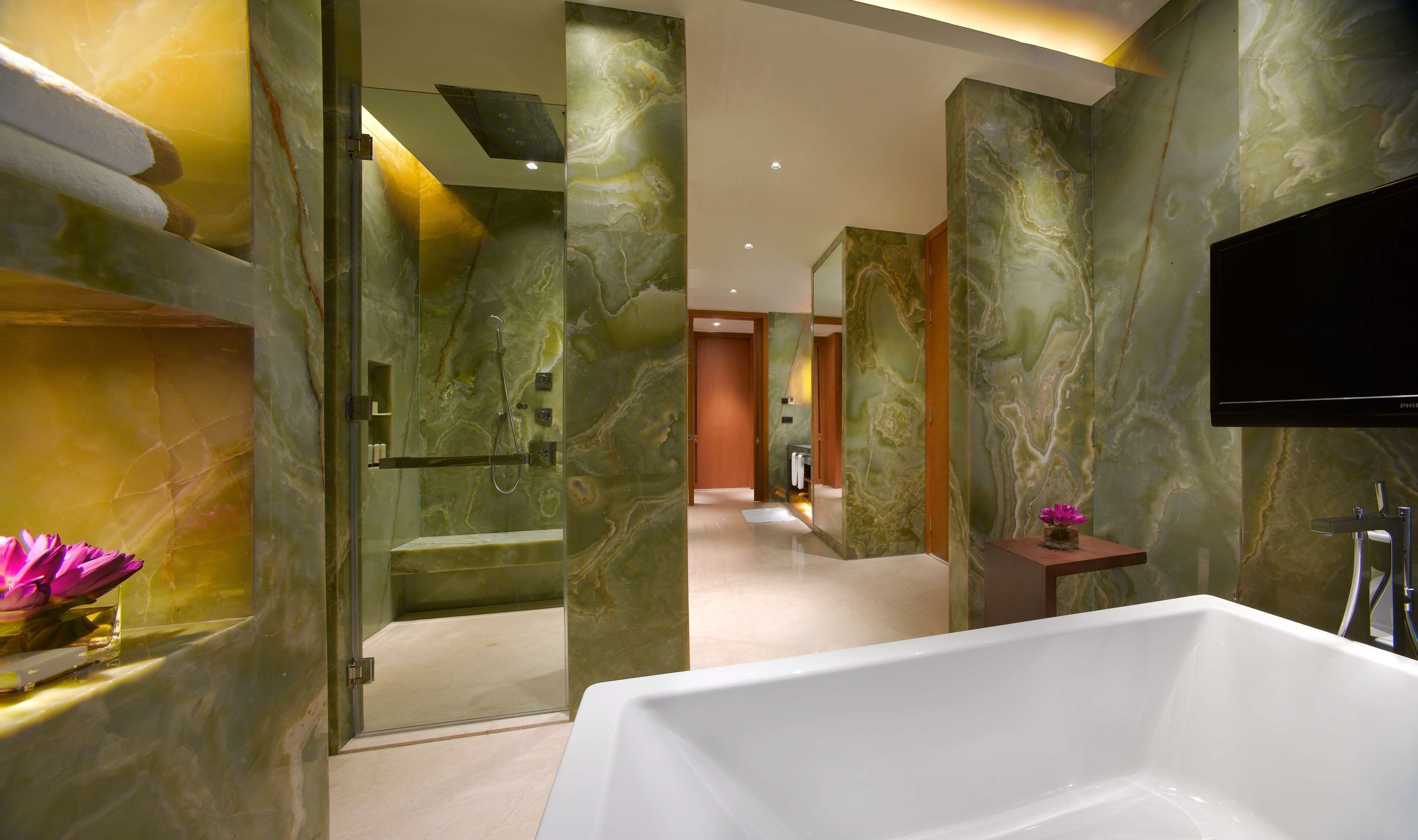 separate bathtub and shower, deep-soaking bathtub, rainfall showerhead