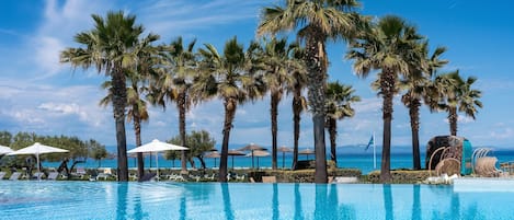 2 outdoor pools, pool umbrellas, pool loungers