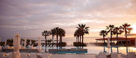 2 outdoor pools, pool umbrellas, pool loungers