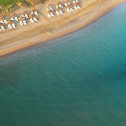On the beach, sun loungers, beach umbrellas, beach towels