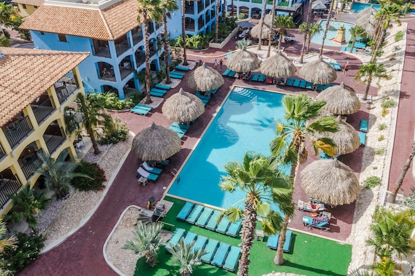 6 outdoor pools, open 8:00 AM to 7:00 PM, pool umbrellas, sun loungers