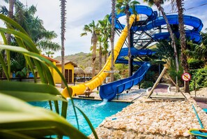 6 outdoor pools, open 8:00 AM to 7:00 PM, pool umbrellas, pool loungers - Kunuku Resort All Inclusive Curacao, Trademark by Wyndham (Daniel)