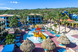 6 outdoor pools, open 8:00 AM to 7:00 PM, pool umbrellas, pool loungers - Kunuku Resort All Inclusive Curacao, Trademark by Wyndham (Daniel)