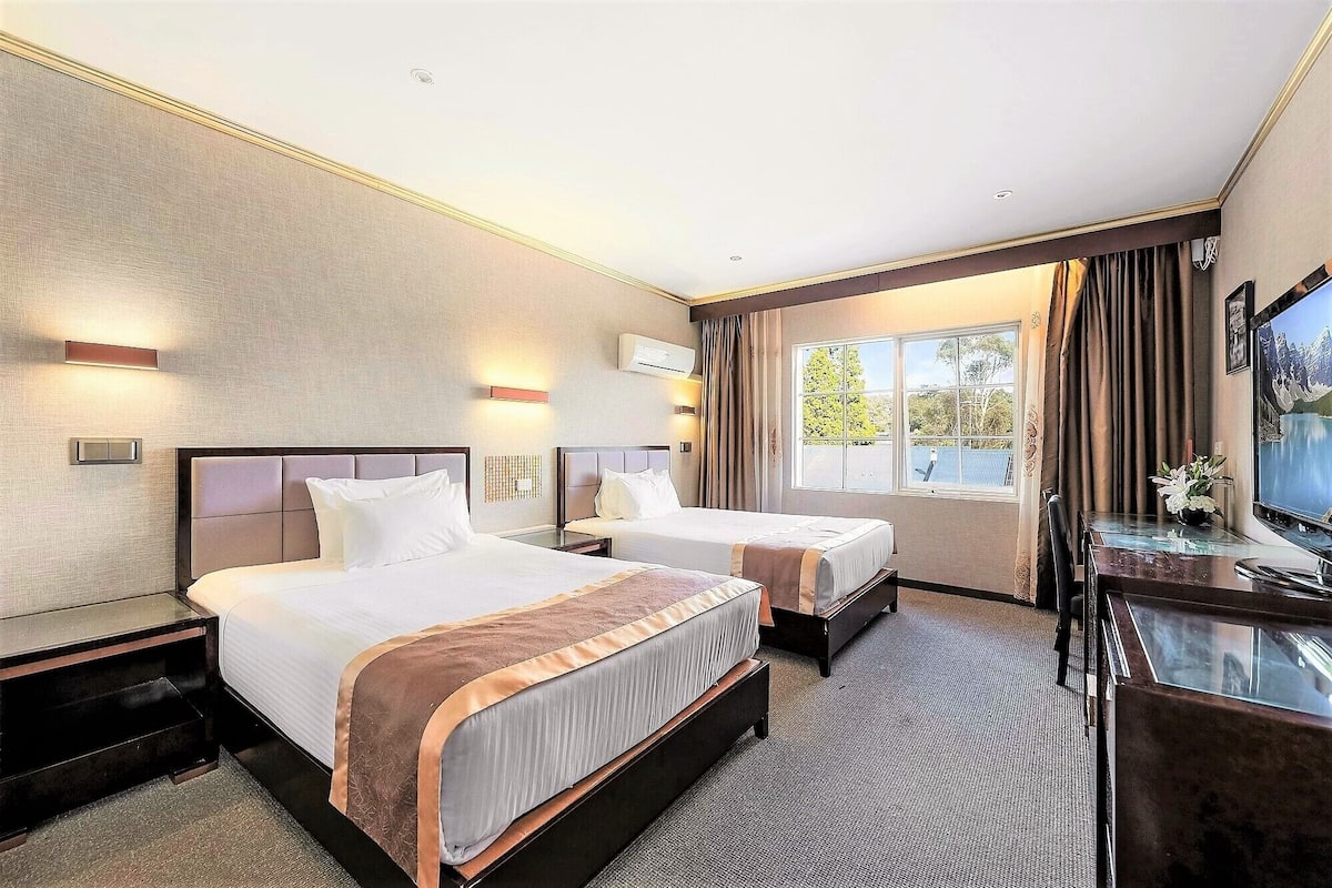 Deluxe Hotel Room with Two Double Beds | 2 bedrooms, blackout drapes, soundproofing, iron/ironing board