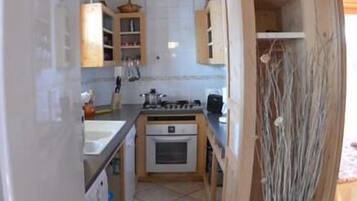 Departamento, 3 habitaciones | Cocina privada