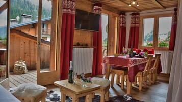 Apartment, 2 Bedrooms | Living area | Flat-screen TV