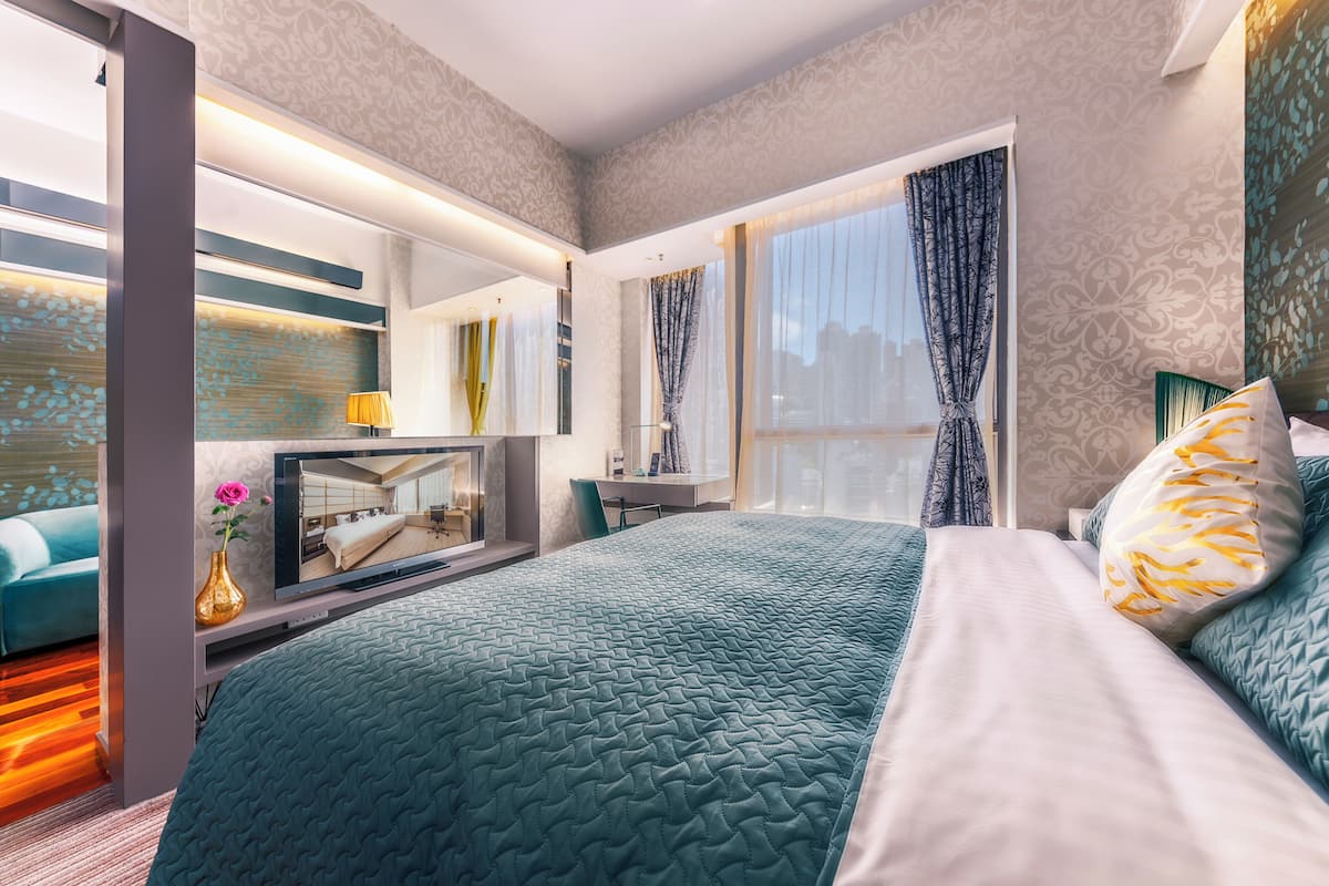 Premium bedding, down comforters, Select Comfort beds, in-room safe