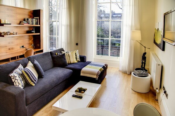 40-inch flat-screen TV with satellite channels, TV, iPod dock