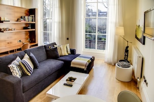 40-inch flat-screen TV with satellite channels, TV, iPod dock