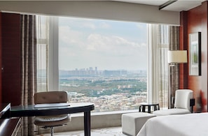 Premium bedding, down comforters, minibar, in-room safe