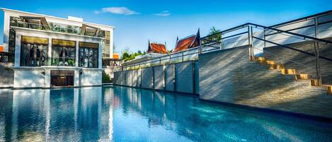 Outdoor pool, pool umbrellas, sun loungers