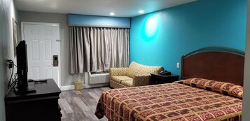 Room, 1 King Bed, Non Smoking | Desk, iron/ironing board, free WiFi, bed sheets