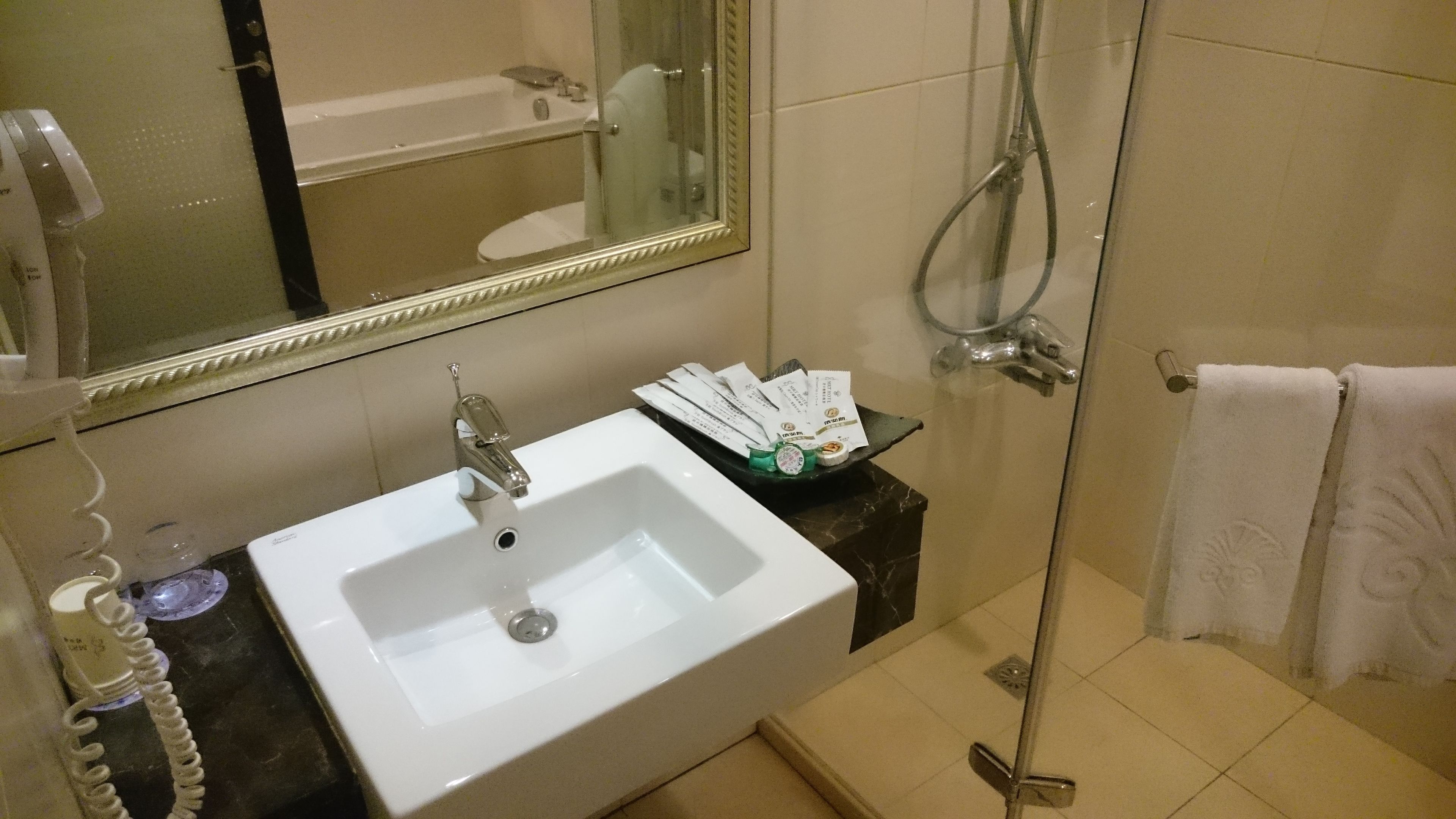 quadruple room, 2 double beds | bathroom | free toiletries, hair dryer, slippers, towels