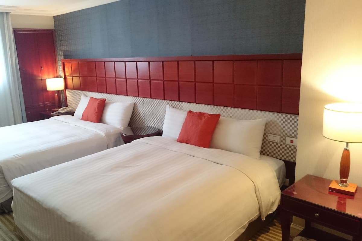 Vierpersoonskamer, 2 tweepersoonsbedden | Luxe beddengoed, donzen dekbedden, pillowtop-bedden, een gratis minibar