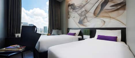 A hotel room with two beds, a chair, a table, and a large abstract painting on the wall.