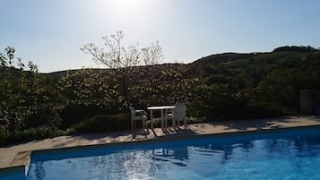 Seasonal outdoor pool, pool umbrellas, sun loungers