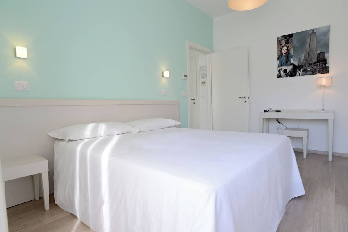 Suite | Egyptian cotton sheets, premium bedding, down comforters, desk
