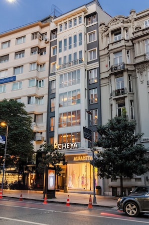 A multi-story building with a modern facade, featuring a prominent 'CHEYA' sign at the ground level. - Cheya Residences Nisantasi Deluxe (Istanbul)