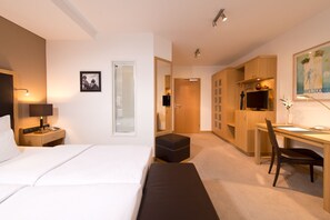 Hypo-allergenic bedding, in-room safe, desk, laptop workspace