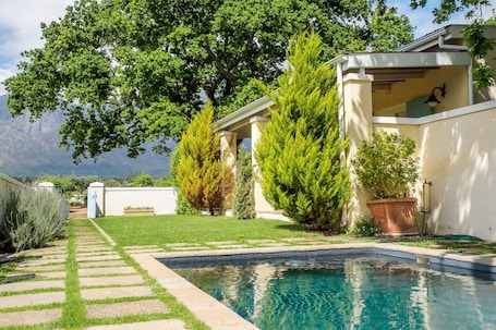 Outdoor pool, pool umbrellas, sun loungers